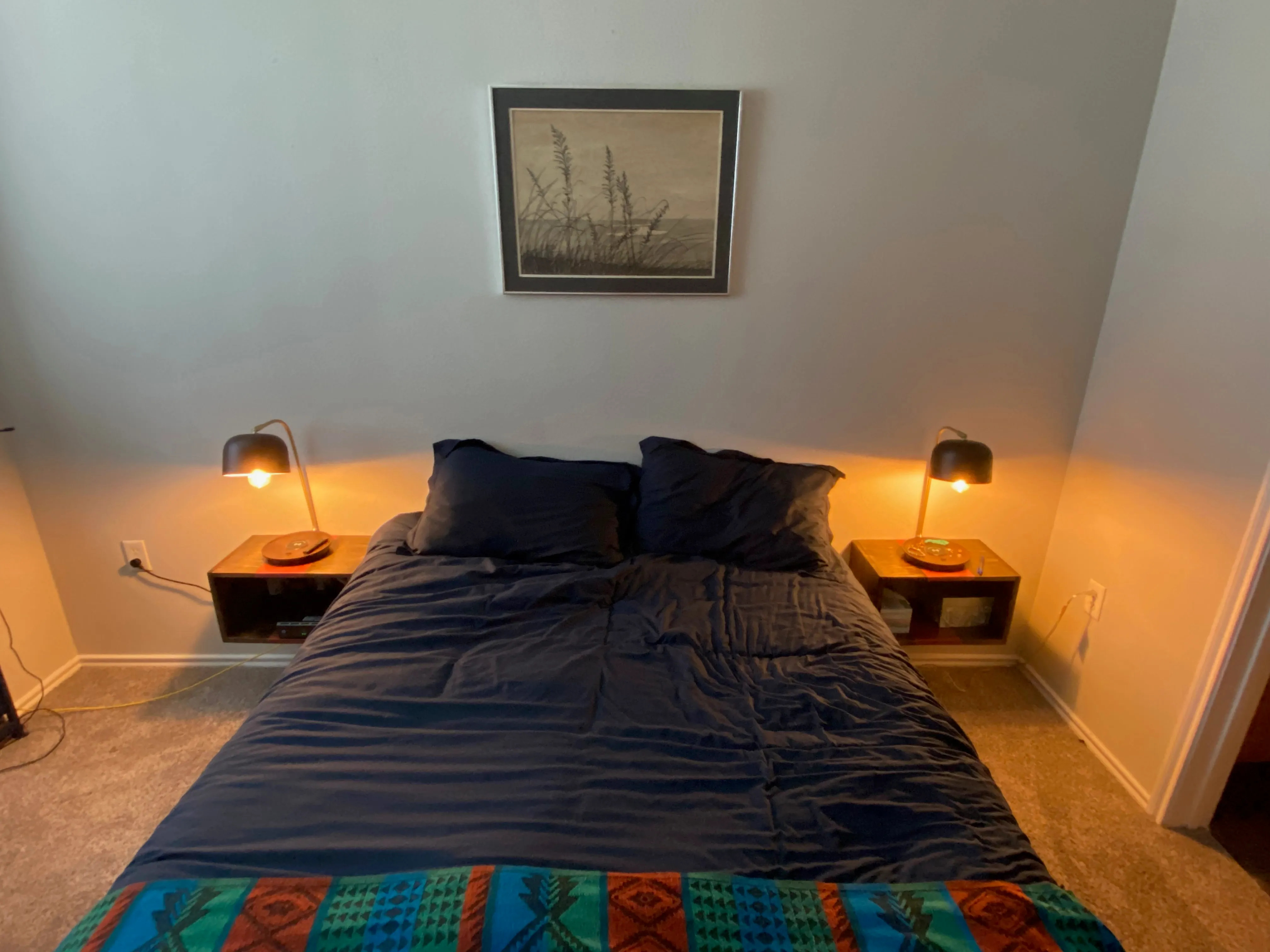 Both end tables floating at either side of my bed